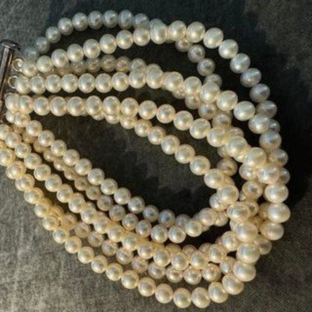 Genuine Multi-Strand Pearl Bracelet.
